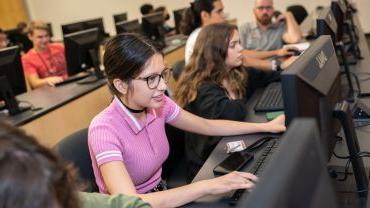 Students working on the computer